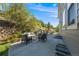 Outdoor patio with comfortable seating, perfect for entertaining or relaxing at 7329 Arco Iris Ln, Castle Pines, CO 80108