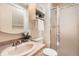 Clean bathroom with a shower stall, white fixtures and plenty of storage space at 1048 N Columbine St, Golden, CO 80403