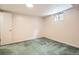 Bedroom featuring a window and green carpet, offering a serene and comfortable space at 1048 N Columbine St, Golden, CO 80403