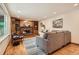 Inviting living room with a cozy fireplace, built-in shelving, and stylish decor at 1048 N Columbine St, Golden, CO 80403