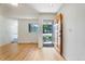 Bright entryway with wood floors and a view to the front yard at 8813 Baseline Rd, Lafayette, CO 80026