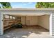 Spacious two-car garage with ample storage and a lawn mower at 8813 Baseline Rd, Lafayette, CO 80026