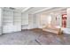 Cozy living room with custom built-ins and unique stone flooring at 8813 Baseline Rd, Lafayette, CO 80026