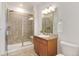 Modern bathroom with tiled shower, updated vanity, and granite countertop at 804 Summer Hawk Dr # 7301, Longmont, CO 80504