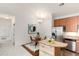 Bright kitchen features stainless appliances and a granite countertop island, with a dining area close by at 804 Summer Hawk Dr # 7301, Longmont, CO 80504