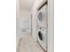 Hallway view of in-unit stackable washer and dryer at 804 Summer Hawk Dr # 7301, Longmont, CO 80504