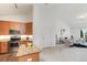 Living room and kitchen combination that offers modern appliances and a warm ambiance at 804 Summer Hawk Dr # 7301, Longmont, CO 80504