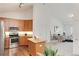 View of the open-concept design connects the living room with the kitchen, inviting and modern appeal at 804 Summer Hawk Dr # 7301, Longmont, CO 80504