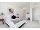 Sunlit main bedroom featuring plush carpeting, a large window, and neutral decor at 804 Summer Hawk Dr # 7301, Longmont, CO 80504