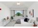 Bright main bedroom featuring plush carpeting, a large window, and neutral decor at 804 Summer Hawk Dr # 7301, Longmont, CO 80504