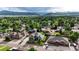 Panoramic aerial view of the neighborhood, showcasing the lush landscape and mountain views at 8623 S Wadsworth Ct, Littleton, CO 80128
