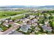 Scenic aerial view capturing the home's location near the highway and lake at 8623 S Wadsworth Ct, Littleton, CO 80128