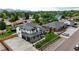 Overhead view showcases the home's modern design, landscaping, and spacious driveway at 8623 S Wadsworth Ct, Littleton, CO 80128