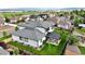 Aerial view of the backyard featuring a patio and well-maintained lawn at 8623 S Wadsworth Ct, Littleton, CO 80128