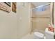 Well-lit bathroom with a shower and tiled floor at 7019 S Windermere St, Littleton, CO 80120