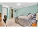 Bright bedroom featuring carpet, a closet, and natural light at 7019 S Windermere St, Littleton, CO 80120