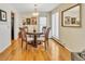 Cozy dining area featuring hardwood floors, natural light, and classic decor at 7019 S Windermere St, Littleton, CO 80120