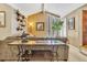 Cozy living room featuring a comfortable sofa, natural light, and stylish decor elements at 7019 S Windermere St, Littleton, CO 80120