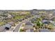 Overhead view of a community featuring a blend of single-Gathering homes, streetscapes, and mountain views at 3995 Manorbrier Cir, Castle Rock, CO 80104