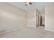 Spacious carpeted bedroom with ceiling fan at 3995 Manorbrier Cir, Castle Rock, CO 80104