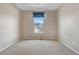 Carpeted bedroom with window view to outside at 3995 Manorbrier Cir, Castle Rock, CO 80104