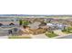 Aerial view of a home with well-maintained lawn, a two-car garage, and backyard fencing at 3995 Manorbrier Cir, Castle Rock, CO 80104