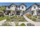 Charming two-story home with landscaped front yard, perfect for curb appeal at 2525 S Pearl St, Denver, CO 80210