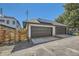 Detached two-car garage featuring solar panels on the roof at 2525 S Pearl St, Denver, CO 80210