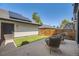 Outdoor patio with chairs and artificial grass, perfect for relaxing at 2525 S Pearl St, Denver, CO 80210
