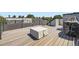 Spacious rooftop deck with comfortable furniture and neighborhood views at 2525 S Pearl St, Denver, CO 80210