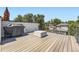 Rooftop deck with grill and furniture, perfect for outdoor entertaining at 2525 S Pearl St, Denver, CO 80210