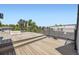 Rooftop deck with modern railings, offering serene neighborhood views at 2525 S Pearl St, Denver, CO 80210