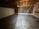 Spacious garage interior with a concrete floor and an automatic garage door at 3577 S Ouray Cir, Aurora, CO 80013