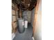 Utility room shows water heater and other mechanicals and unfinished walls at 3577 S Ouray Cir, Aurora, CO 80013