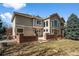 Beautiful backyard featuring a spacious lawn and patio for outdoor entertaining at 21548 E Ottawa Cir, Aurora, CO 80016