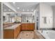 Bright bathroom with double sinks and marble countertops at 21548 E Ottawa Cir, Aurora, CO 80016