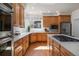 Kitchen with hardwood floors, stainless steel appliances, gas range, and white countertops at 21548 E Ottawa Cir, Aurora, CO 80016