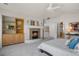 This large main bedroom features a fireplace and open bathroom entrance at 21548 E Ottawa Cir, Aurora, CO 80016