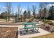 Park playground featuring multiple play structures and picnic benches at 21548 E Ottawa Cir, Aurora, CO 80016