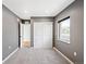 Neutral bedroom with carpet, closet, and natural light from the window at 3926 Kalamath St, Denver, CO 80211