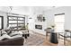 Modern fireplace design with decorative accents and ample natural light at 3926 Kalamath St, Denver, CO 80211