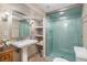 Updated bathroom with tiled shower, modern sink, and stylish finishes at 726 S Corona St, Denver, CO 80209