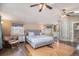 Spacious main bedroom with hardwood floors, vaulted ceilings, and en-suite bathroom at 726 S Corona St, Denver, CO 80209
