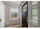 Bright entryway featuring decorative glass windows and a dark wood door with sidelights at 726 S Corona St, Denver, CO 80209