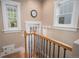 Hallway with a staircase and windows providing natural light at 726 S Corona St, Denver, CO 80209