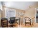 Well-lit office featuring wood floors and a comfortable seating area on the stair landing at 726 S Corona St, Denver, CO 80209