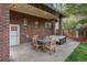Outdoor patio with brick accents and seating area perfect for entertaining at 726 S Corona St, Denver, CO 80209