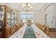 Elegant dining room with ample seating and natural light from the large window at 12421 Irving Dr, Broomfield, CO 80020