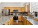 Well-equipped kitchen featuring stainless steel appliances and granite countertops at 12421 Irving Dr, Broomfield, CO 80020
