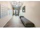 Clean and spacious hallway with mailboxes and comfortable seating at 180 Cook St # 105, Denver, CO 80206